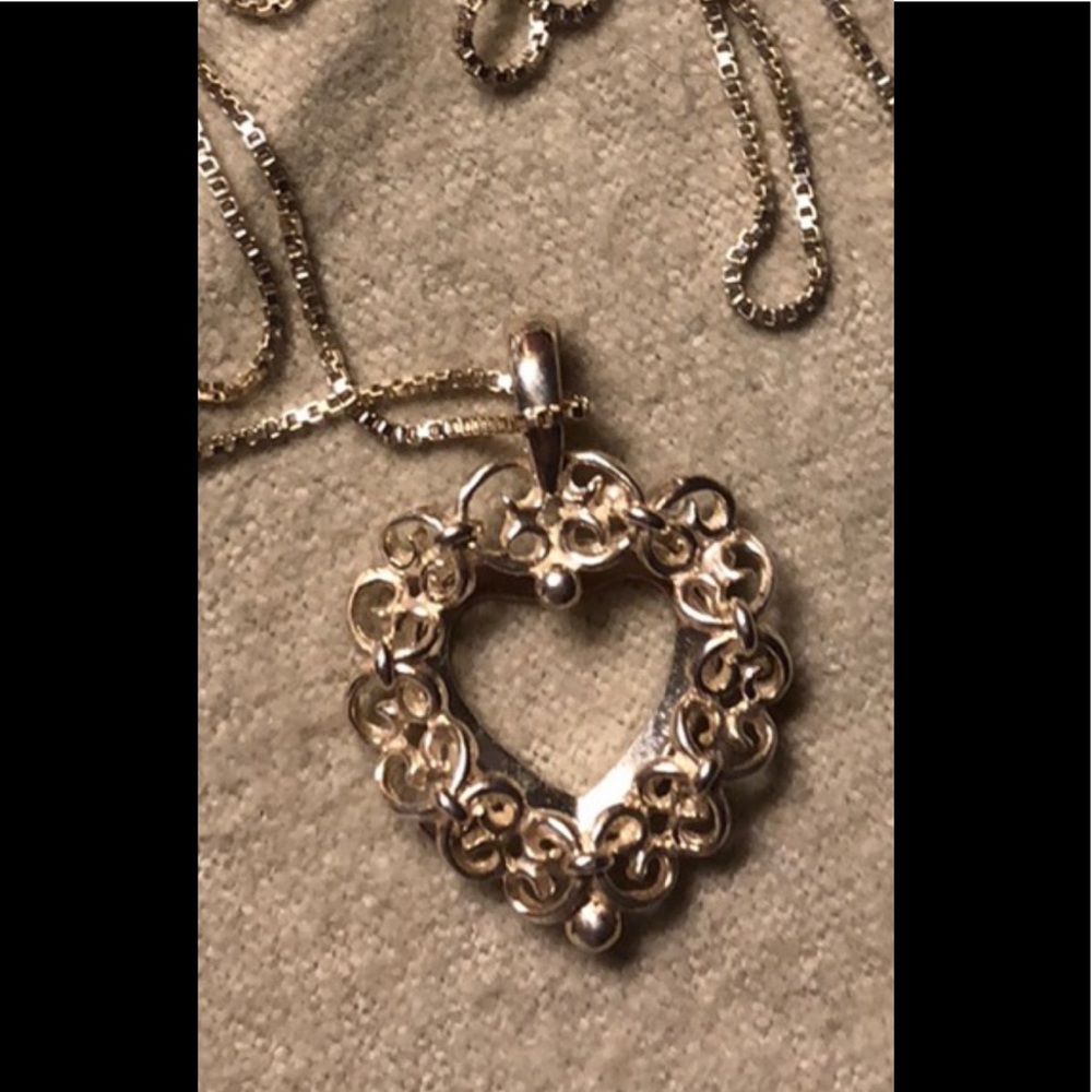 Sliver Filigree Heart Pendant on 12” Silver chain.